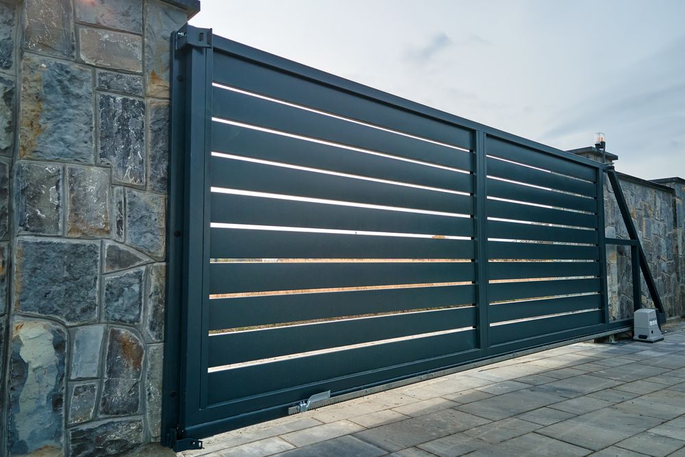 Our Gate Construction service offers homeowners a stylish and secure way to enhance the entrance of their property, providing both aesthetic appeal and added security for peace of mind. for Team Volocko in Hawesville, KY