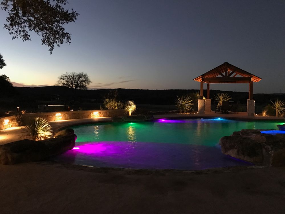 Enhance your home's beauty and security with our expert outdoor lighting landscape service, creating stunning nighttime aesthetics and illuminating pathways for a safe, inviting exterior ambiance all year round. for Green Pastures Lawn Care in Bastrop, TX