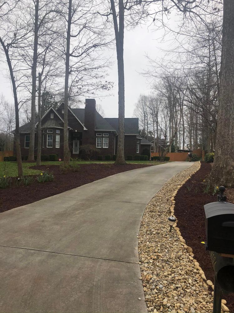 We offer professional mulch installation services to help your lawn look its best. Our team of experts will handle the job quickly and efficiently. for Reiser Lawn Service in Denver, North Carolina