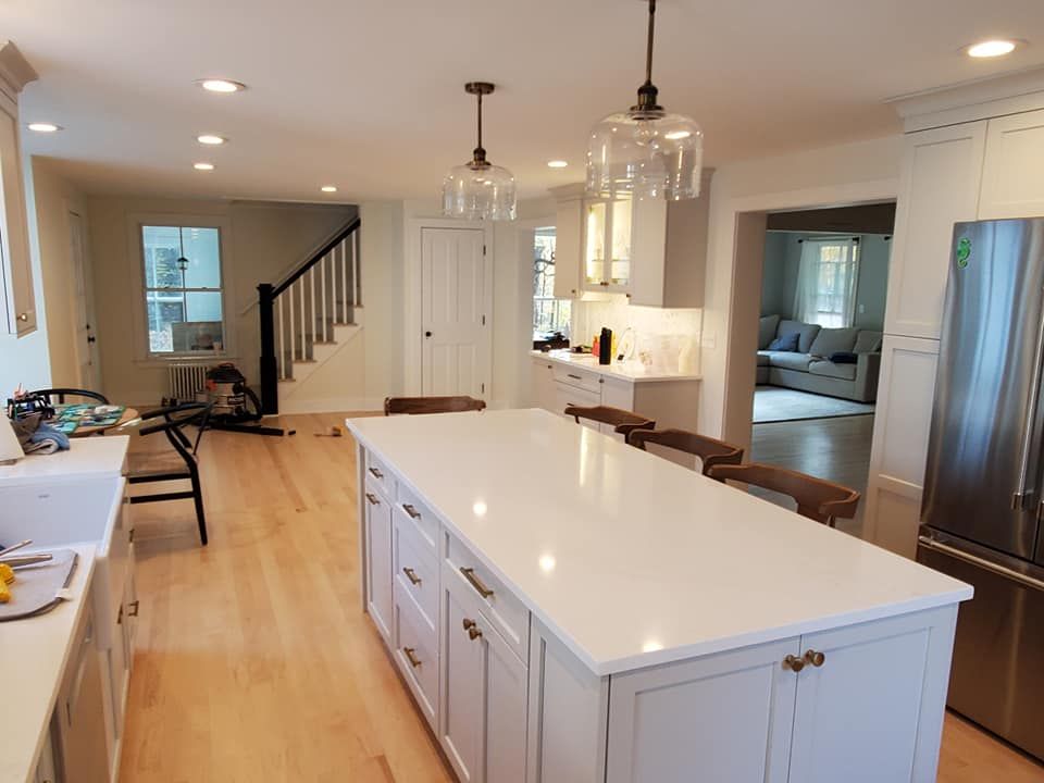 Transform your kitchen with our expert cabinet refinishing near me service, providing a cost-effective solution to renew and enhance the beauty of your cabinets without needing full replacements. for Integrity Painting in Manchester, CT