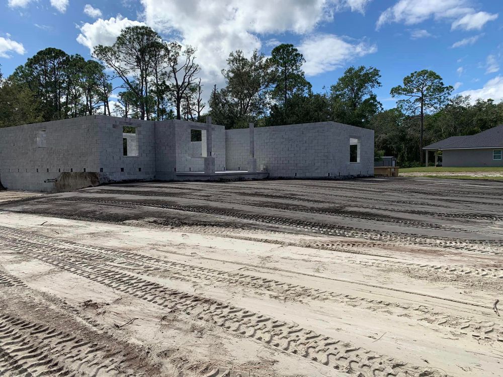 Our grading service ensures precise leveling and smoothing of your property's surface, providing a stable foundation for construction projects, landscaping improvements, or drainage solutions. Contact us for expert assistance. for All Track Construction in Mims, FL