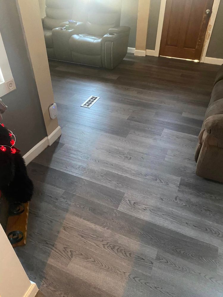 Our Floor Repair service expertly restores your floors to their original condition, addressing issues like scratches, dents, and water damage efficiently, ensuring durability and enhancing the beauty of your home's interior. for A Carpet Guy Floors in Baltimore, MD