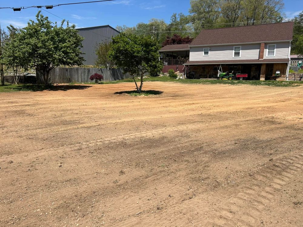 Our Leveling service ensures a stable foundation for your construction projects by expertly grading and smoothing the land, providing an even surface essential for optimal structural support and landscape readiness. for Moose Excavating in Athens, TN