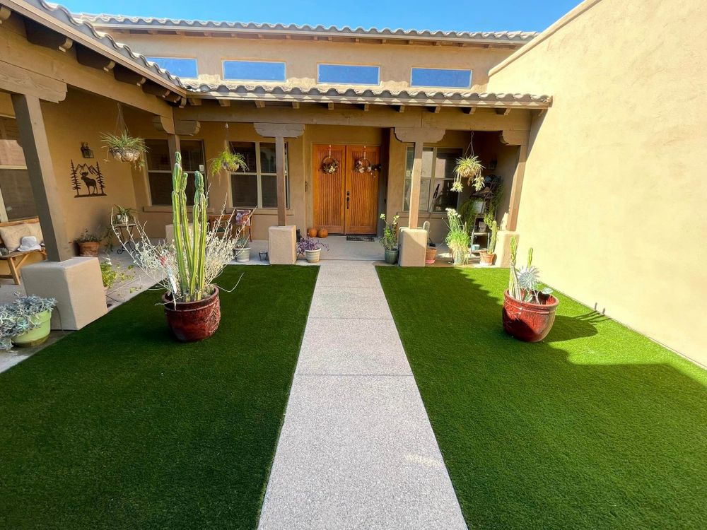 Enhance your outdoor living space with our turf installation service, perfect for homeowners seeking a low-maintenance solution to complement their deck & patio installations, providing a lush green landscape all year round. for Arizona Home and Yard Solutions LLC in Vail, AZ