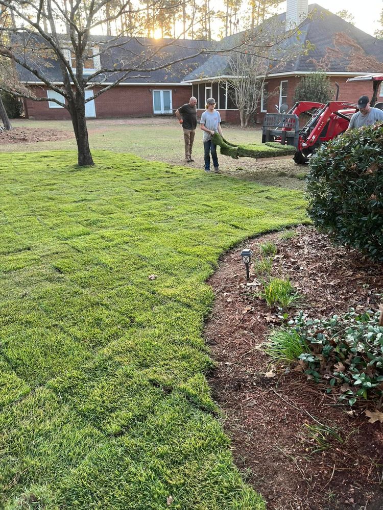 Revitalize your lawn with our professional sodding service, offering quick installation of lush, healthy turf to enhance curb appeal and ensure a vibrant landscape for your home immediately after completion. for South Ga. Land Development in Hazlehurst, GA