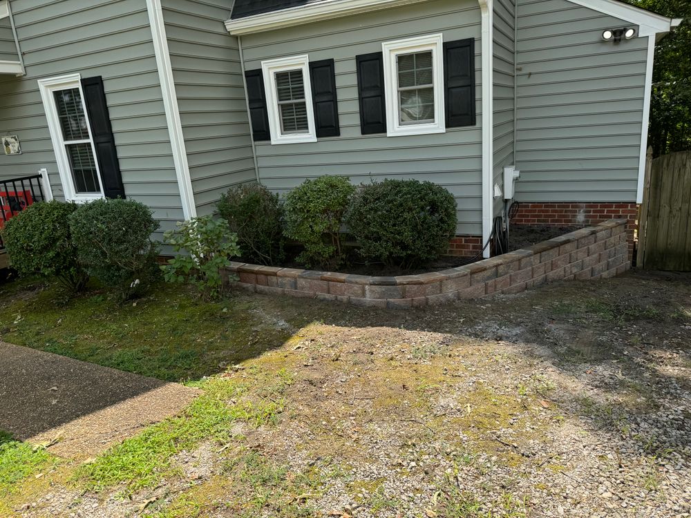Our expert team offers professional retaining wall construction service to protect your property from erosion and create aesthetic appeal. Trust us to enhance the beauty and functionality of your landscape. for Robbie's Lawn & Landscape in Chesterfield, VA
