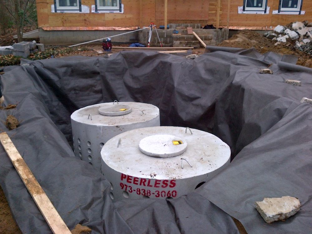Our Excavating Company offers expert Drainage System Install & Repair services, ensuring your property remains protected from water damage while enhancing its value and functionality. Discover competitive driveway cost solutions today. for Preferred Excavating in Martinsville, NJ