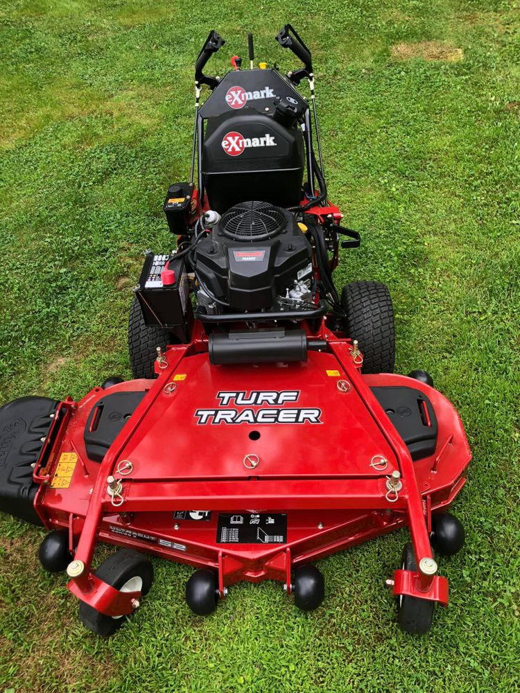 Enhance your lawn's beauty with our professional mowing service, offering precise cuts, regular maintenance, and expert care to ensure a lush and pristine yard that boosts your home's curb appeal. for S.C. Landscaping in Franklin, NH
