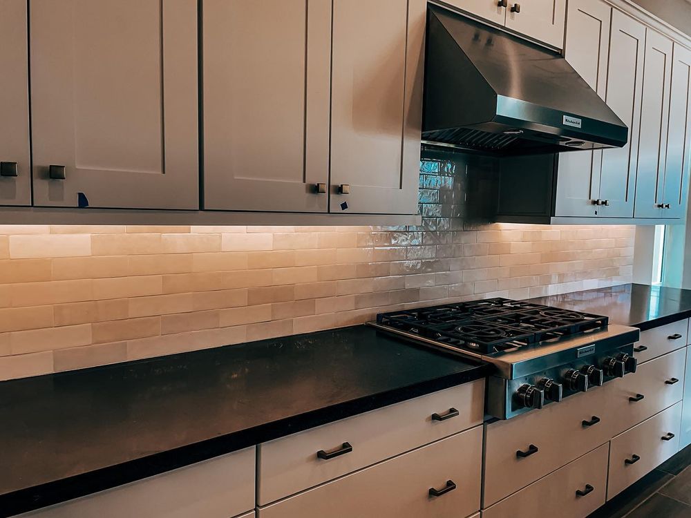 Our Kitchen Backsplash service offers homeowners a stylish and functional solution for protecting their kitchen walls while adding a decorative element to enhance the overall aesthetic of their space. for Flawless Tile Company in Boise, ID