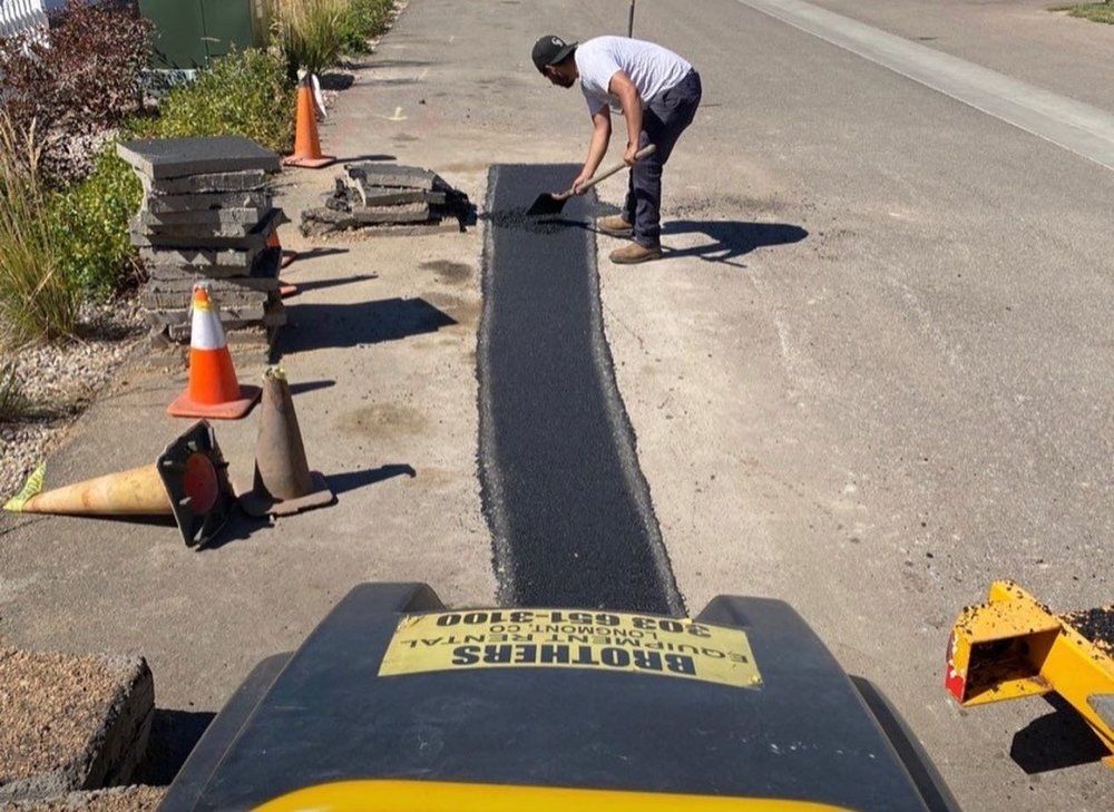 Our Asphalt services offer homeowners a durable and cost-effective solution for their driveway needs, providing a smooth and long-lasting surface that enhances the curb appeal of their property.

**Services Offered:**

- **Crack Fill:** Repairing cracks to prevent further damage and extend the life of your asphalt surfaces.
- **Seal Coating:** Protecting your asphalt from weather damage and wear.
- **Pothole Repair:** Fixing potholes to ensure safe and smooth surfaces.
- **Striping:** Professional line striping for parking lots and roadways.
- **New Asphalt Installation:** High-quality asphalt paving for new projects. for Meraki Services in Longmont, CO