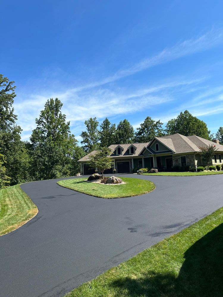 Protect and extend the life of your asphalt with our professional sealcoating service. We apply a high-quality sealant that safeguards against weather, UV damage, and wear, enhancing your pavement's appearance and durability for years to come. for James R Carter Paving in Roanoke, VA