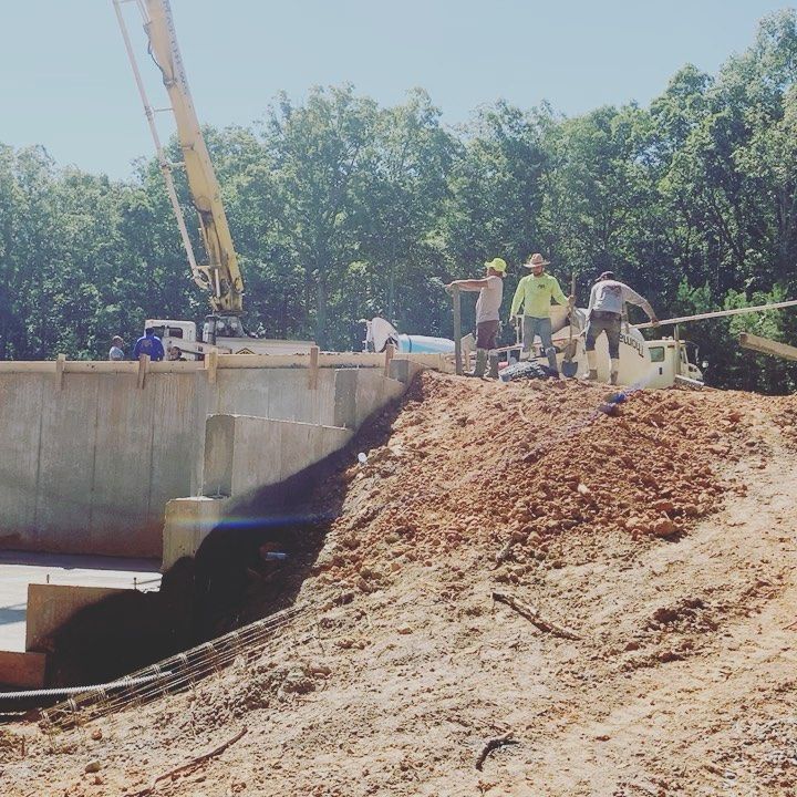 Our Commercial Concrete service offers homeowners exceptional durability and aesthetic appeal for driveways, pathways, and patios with expertly crafted designs tailored to enhance your property's value and long-term resilience. for Arsa Contracting LLC in Dallas, GA