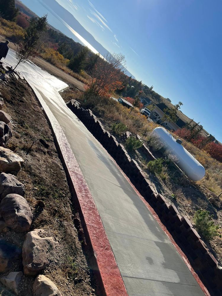 Our Sidewalk Installation service offers homeowners the opportunity to enhance their property with durable and aesthetically pleasing concrete sidewalks, expertly laid by our skilled team of professionals. for Hard Knox Concrete  in Montpelier, ID