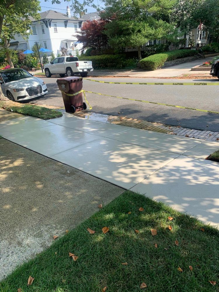 Transform your outdoor space with our Sidewalk Installation service. Our experienced team will create a durable and visually appealing sidewalk that enhances the beauty and functionality of your home. for Manera Concrete in Ventnor City, NJ