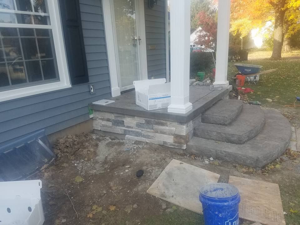 Our expert Step Installation service enhances your home's curb appeal with durable, custom-designed steps that blend seamlessly with your existing exterior, ensuring safety, functionality, and aesthetic charm for any entrance. for Absolute Maintenance in Charlotte, MI