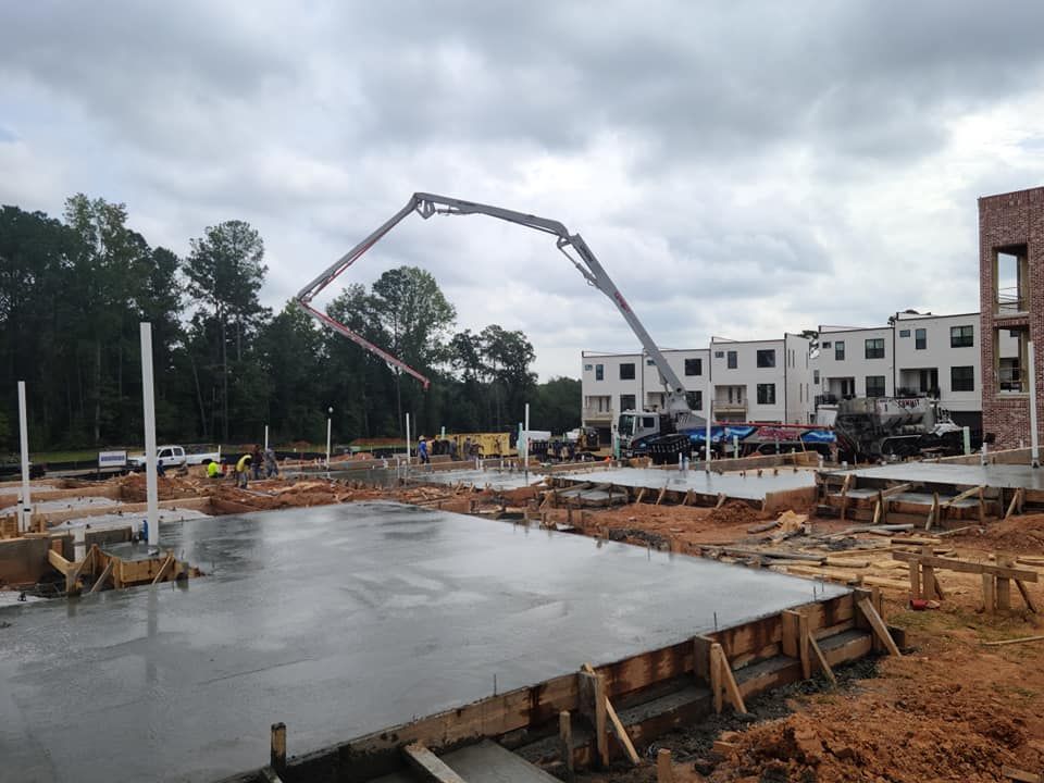 Our concrete services provide durable, high-quality solutions for your home's driveways, patios, and foundations. With expert craftsmanship and premium materials, we enhance both functionality and aesthetic appeal to meet your specific needs. for Summit Sitemix Concrete in Buford, GA