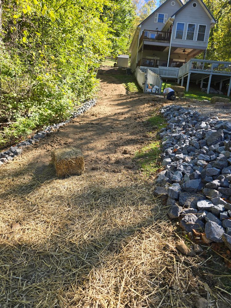 Our aeration and overseeding service enhances soil health, promotes lush growth, and repairs patchy lawns by improving air circulation and nutrient uptake for a more vibrant, resilient landscape. for Williams Lawn and Land in Sharps Chapel, TN