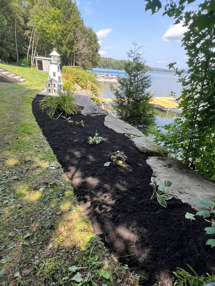 Revitalize your garden with our expert flower bed repair and mulching service, enhancing soil health while adding vibrant beauty to your landscape for a fresh, stunning appearance year-round. for Bishop’s Property Maintenance in Franklin, VT