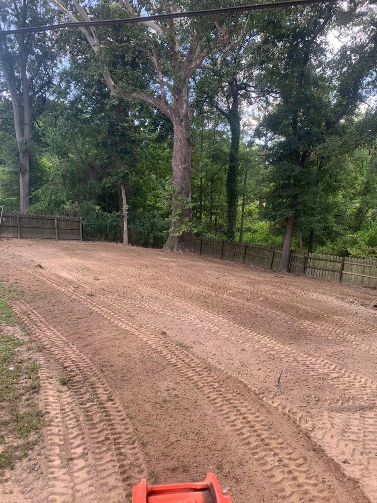 Our Land Grading service expertly levels your property, ensuring optimal drainage and a stable foundation for landscaping or construction projects, enhancing both functionality and aesthetic appeal. Trust us for precision and reliability. for Polasini Land Development in Starkville, MS