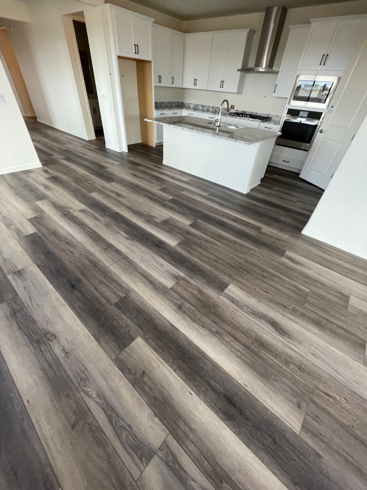 experience stylish and durable laminate flooring services with our expert team. Transform your home with easy-to-maintain, high-quality options designed to withstand daily wear while enhancing your space's aesthetic appeal. for C&N Flooring Solutions LLC in Chino Valley, AZ