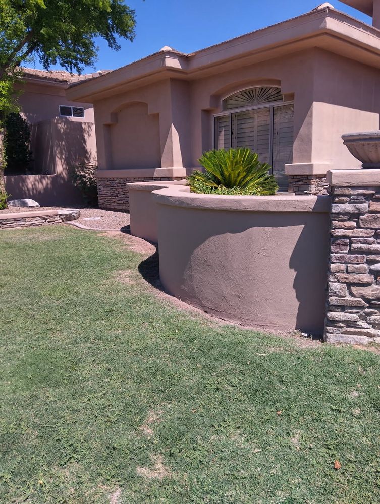 Enhance your home's curb appeal with our expert masonry service, offering durable solutions and vibrant finishes using premium masonry paint for a beautifully crafted, lasting impression on any outdoor space. for Deserts Voice Construction in Queen Creek, AZ