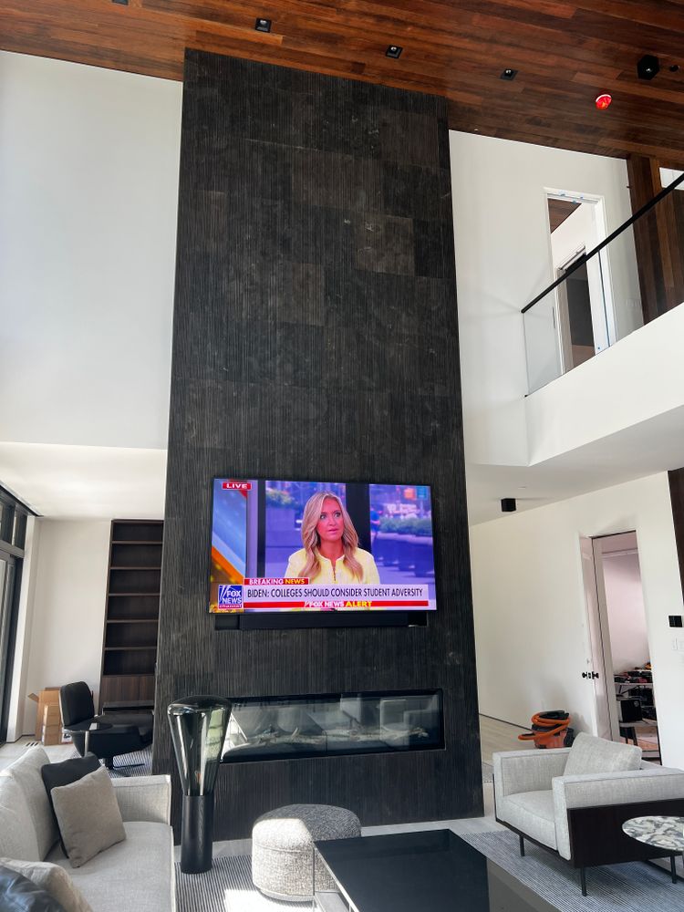 Enhance your fireplace with our professional service. Choose from a variety of styles and materials to create a stunning focal point that reflects your personal style and enhances functionality. for Tafoya Tile & Custom Designs in Boulder, CO