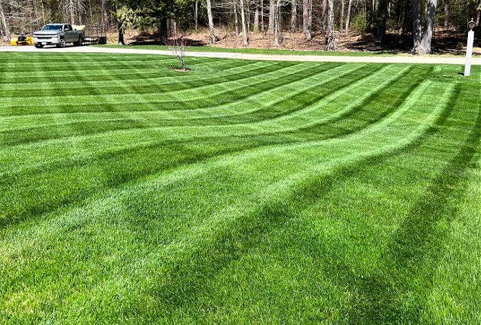 Our Lawn Maintenance service ensures lush, healthy lawns through expert mowing, fertilization, and pest control, providing homeowners with personalized care for vibrant outdoor spaces throughout the year. for RK Outdoor Services in Weare, NH