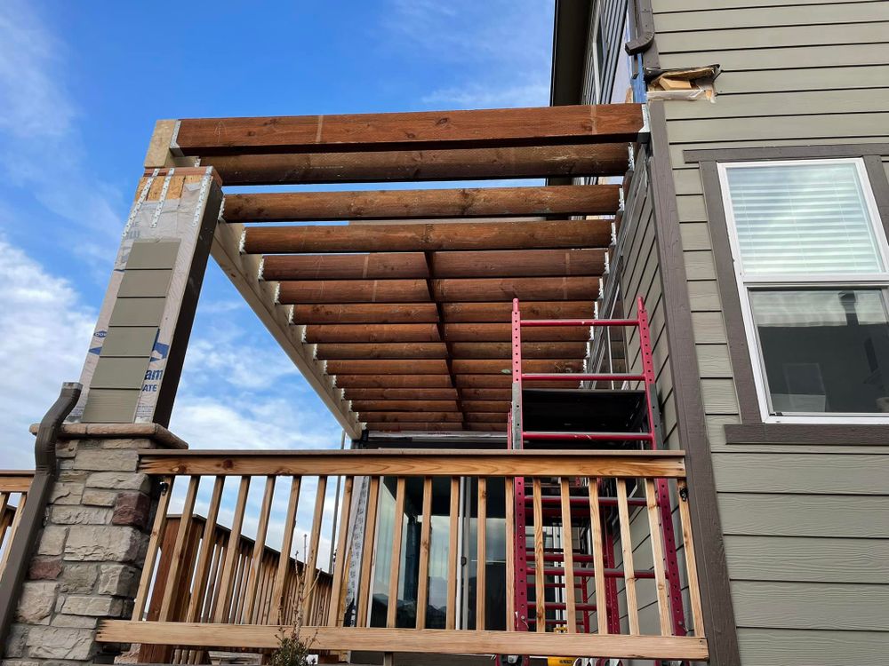 Enhance your outdoor living space with our custom pergolas, expertly designed and crafted to provide stylish shade and elevate your backyard's beauty. Transform your garden into a sophisticated oasis today. for Black Gold Construction & Design in Greeley, CO
