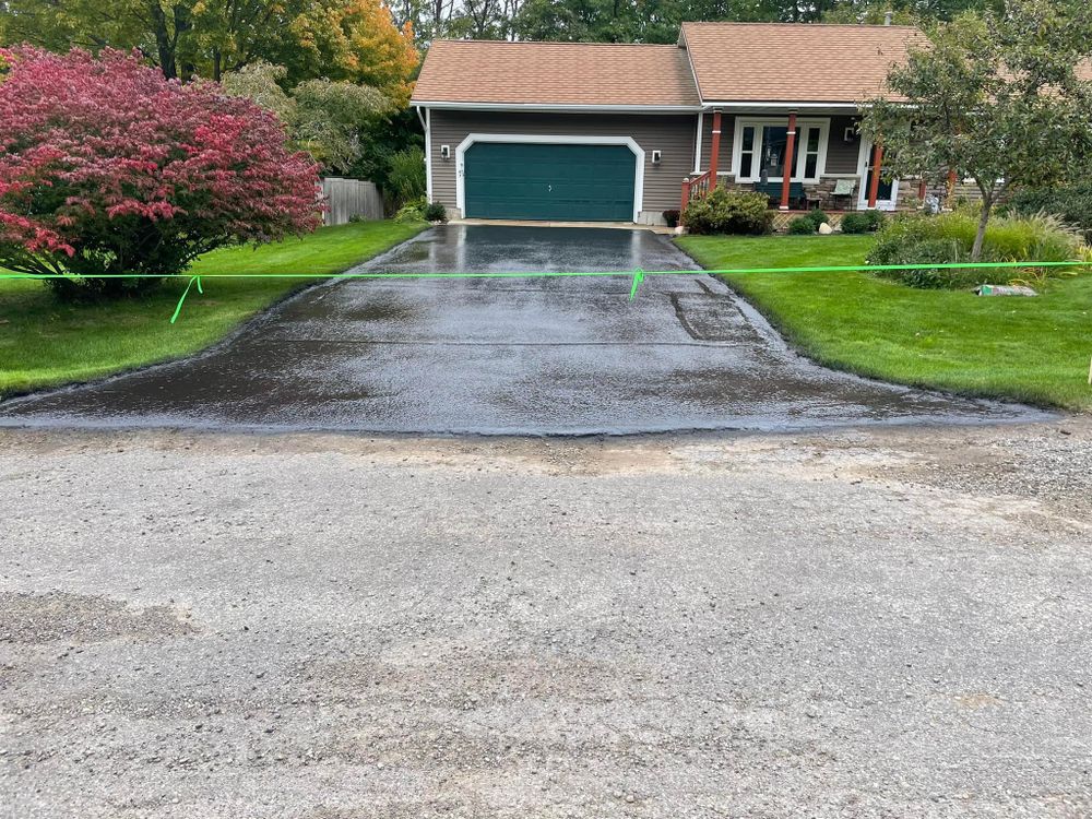 Enhance your property's curb appeal with our professional striping service, delivering precision and durability for driveways and walkways, ensuring safety and a visually appealing finish that lasts. for Buddy’s Blacktop in Cadillac, MI