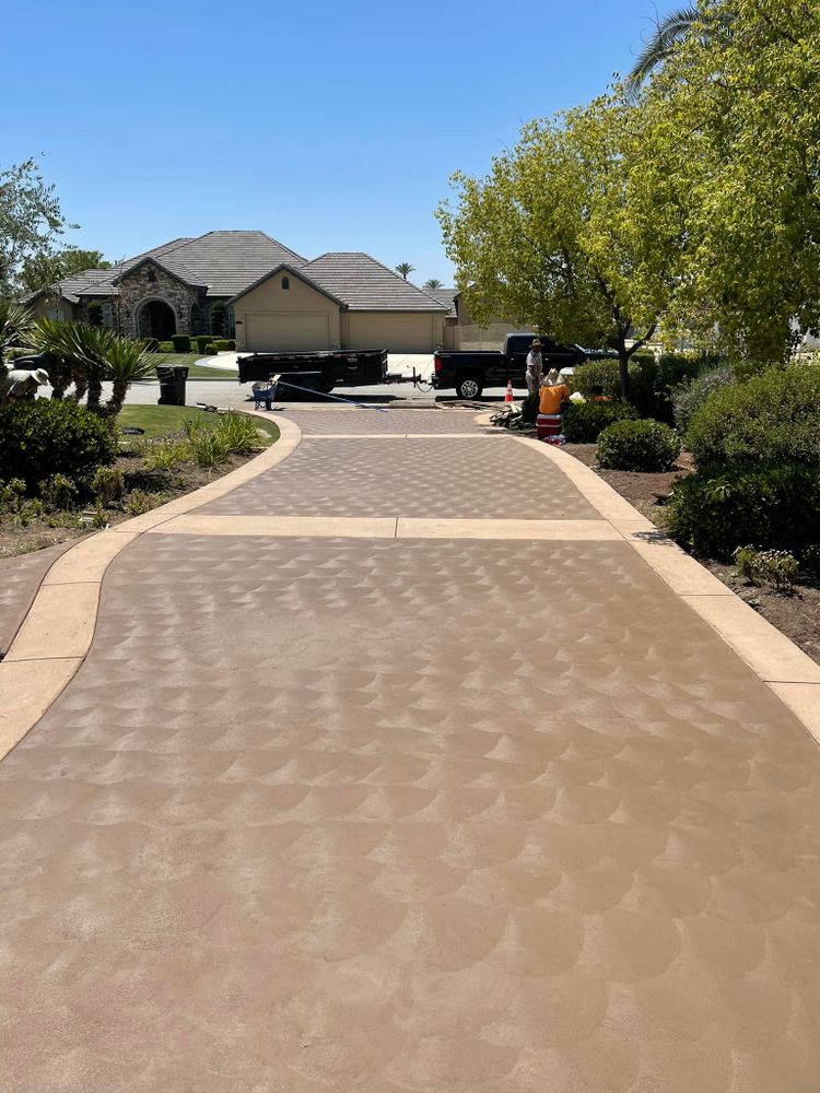 Our Sidewalk Installation service offers homeowners a durable and attractive concrete pathway for their property. We specialize in providing quality craftsmanship that enhances curb appeal and increases the value of your home. for Ryan Berrys Concrete Construction in Bakersfield, CA