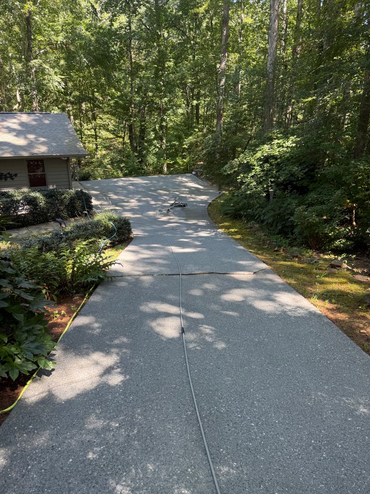 Revitalize your home's exterior with our Driveway and Sidewalk Cleaning service, expertly removing dirt, stains, and debris for a spotless finish that enhances curb appeal and extends surface longevity. for Paratrooper Pressure Washing in Bradenton, FL