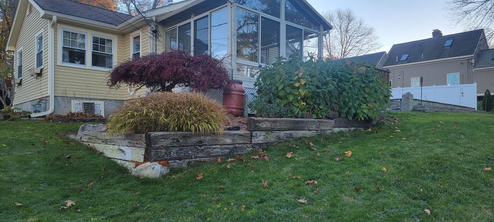 Our Shrub Trimming service ensures your shrubs are expertly shaped, promoting healthy growth and enhancing curb appeal, while our team meticulously maintains the aesthetic balance of your landscape. for Romero Máster Landscaping in Lunenburg, MA