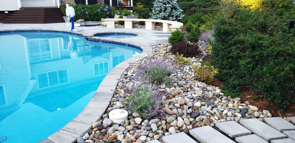 Transform your outdoor space with our Patio Design & Construction service, offering custom masonry solutions for beautiful, durable patios that enhance your home's aesthetic and provide a perfect spot for relaxation or entertaining. for Glen R. Guilman Construction in Goshen, CT