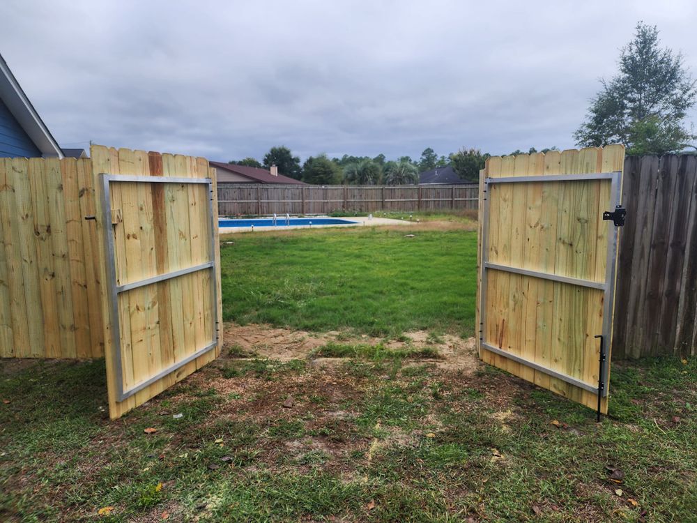 Our Gate Installation and Repair service provides homeowners with professional assistance in installing or fixing gates, ensuring functional and secure entry points for their properties. for Phillips Fencing Solutions in Pensacola, FL