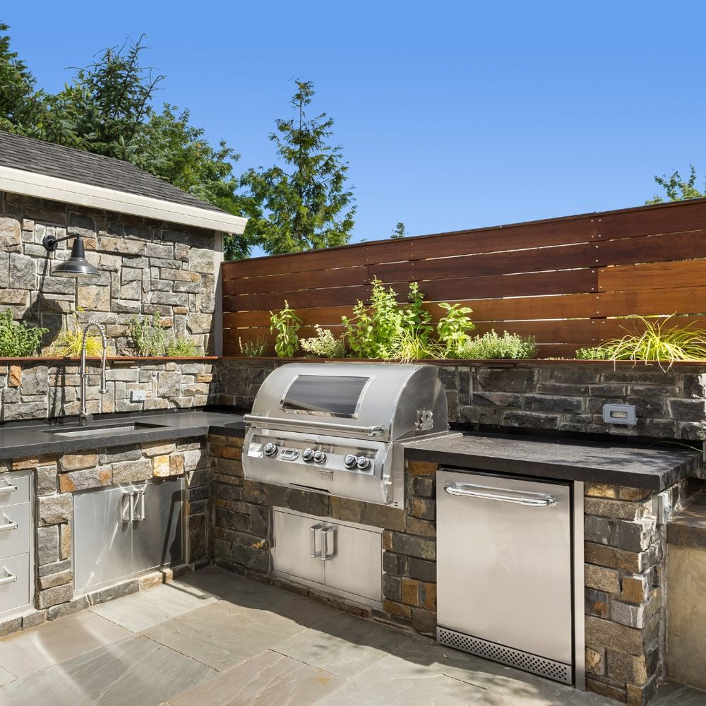 Transform your backyard with our Outdoor Kitchens service, creating the perfect space for cooking and entertaining. experience seamless design and installation tailored to enhance your outdoor living enjoyment year-round. for Zammito Landscape Construction in Dorchester, MA