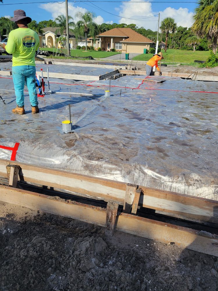 Our Concrete Slab Construction service ensures a durable foundation for your home projects, combining expert craftsmanship with high-quality materials to deliver long-lasting and reliable concrete slabs tailored to your specific needs. for Ferrer Construction in Arcadia, FL