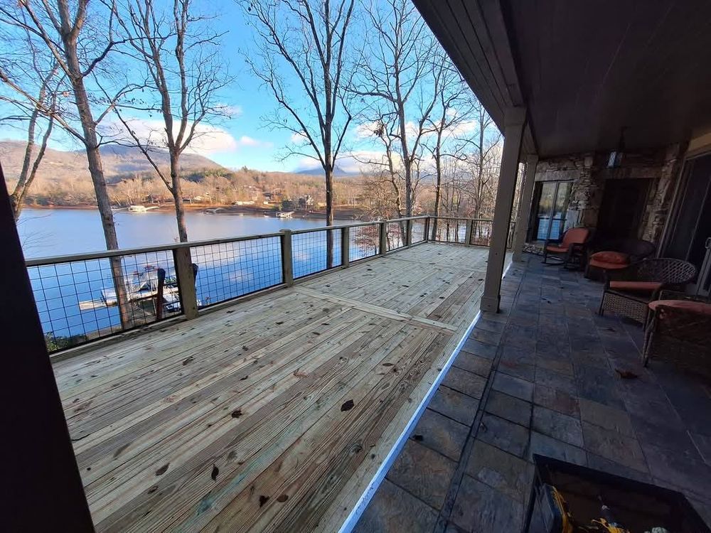 Enhance your outdoor living space with our expert deck and patio construction services. We specialize in creating custom designs that blend functionality and beauty, adding value and enjoyment to your home. for Blue Collar Construction in Blue Ridge, GA