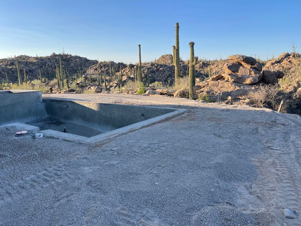 Our expert excavating contractor provides precise pool excavation and grading services, ensuring your backyard transformation is seamless and ready for the perfect pool installation with minimal disruption to your landscape. for Roughout Excavation in Vail, AZ