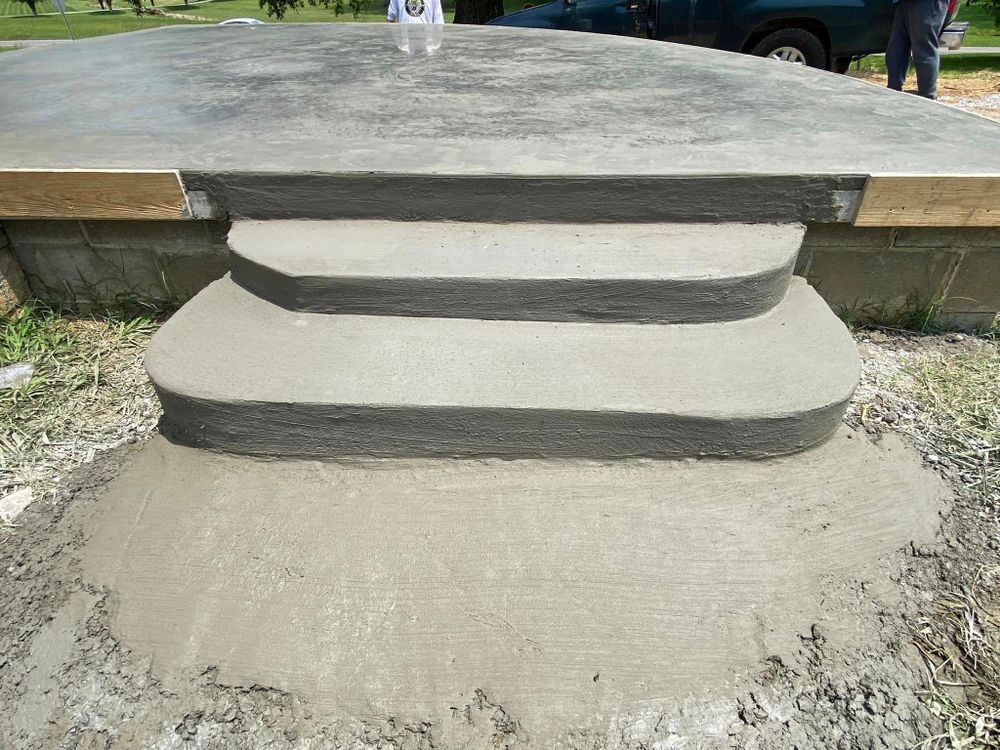 Our Stair Design & Installation service offers homeowners the opportunity to enhance their property with durable and stylish concrete stairs, expertly crafted to elevate the aesthetics and functionality of their home. for Miranda's Concrete in Cleveland, TN