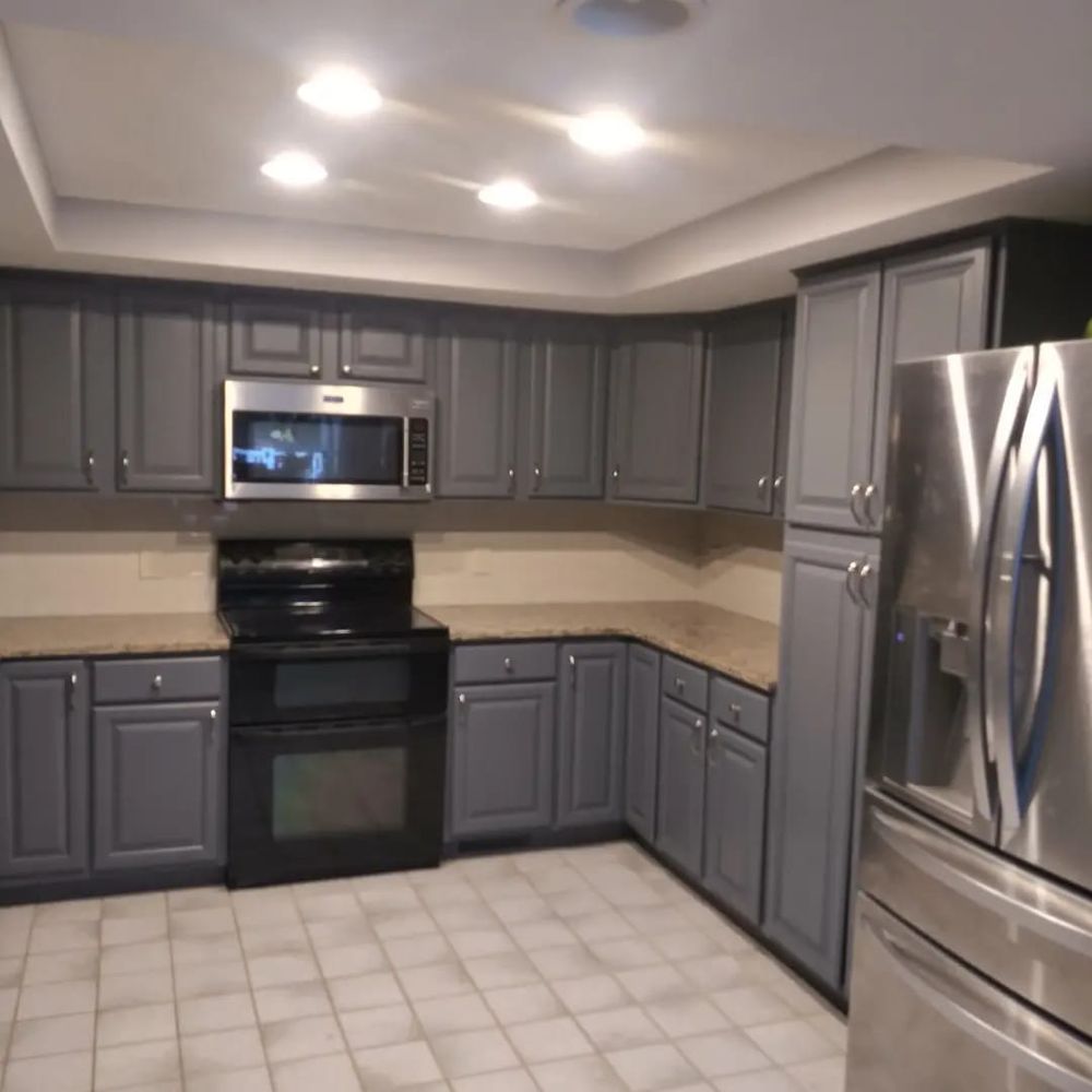 Our Kitchen and Cabinet Refinishing service provides homeowners with a cost-effective way to update and enhance their kitchen by refinishing cabinets, giving them a fresh and modern look. for Bittner Painting in Omaha, NE