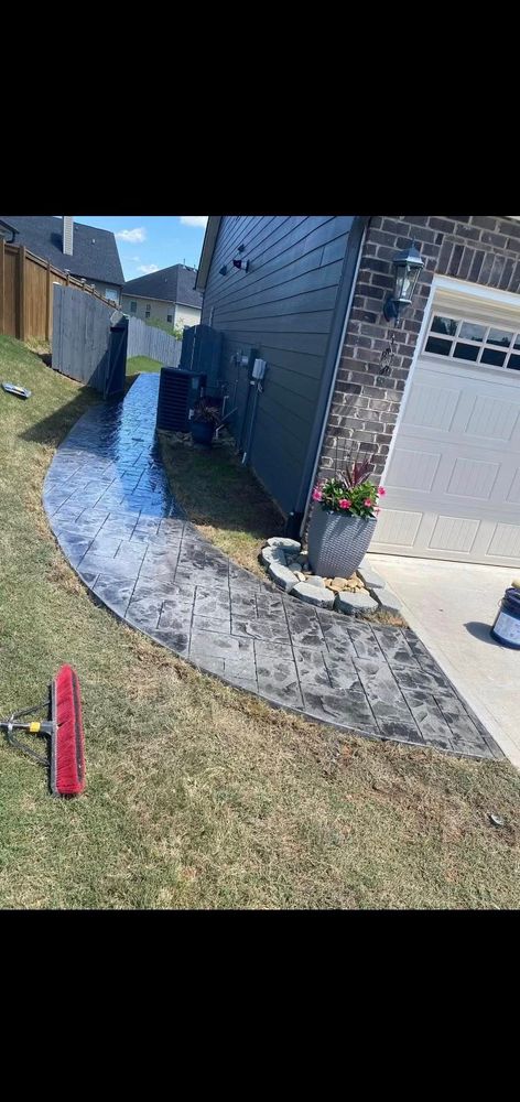 Transform your outdoor spaces with our expert stamped concrete installation services, offering durability and stylish designs that mimic stone or brick at an affordable price, enhancing the beauty of your home. for Wicks Construction Group in Duncan, SC