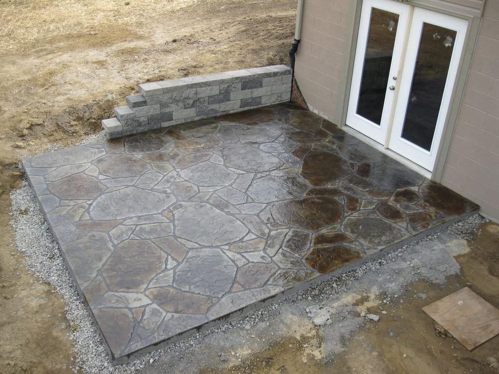 Transform your outdoor space with our Stamped Concrete Installation service, offering durable, visually appealing surfaces that mimic natural stone or brick. Enhance aesthetics while ensuring long-lasting quality and affordability for your home. for Solid Rock Concrete & Landwork in Galion, OH