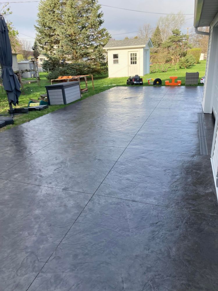 Discover what is concrete stamping: a technique creating beautifully patterned, textured surfaces resembling stone, brick or wood. Transform your home's exterior and boost curb appeal with our expert construction and remodeling services. for Cory Boes Construction & Masonry in Upper Sandusky, OH