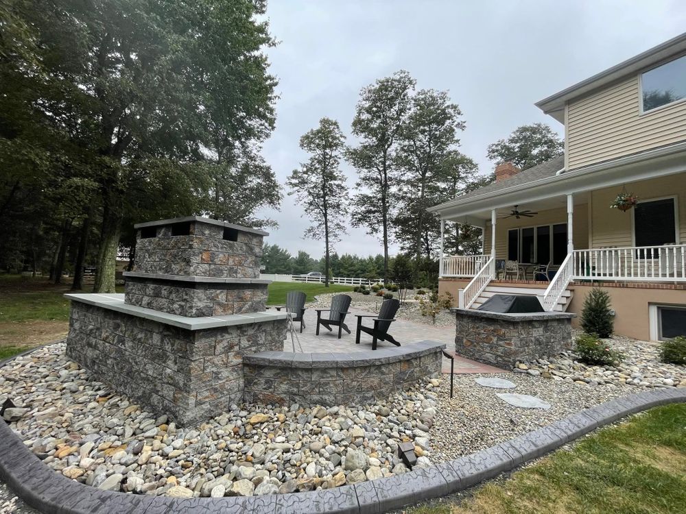 Enhance your outdoor space with our expert retaining wall construction service, providing stability and aesthetic appeal while preventing soil erosion, ensuring long-lasting support tailored to your landscape's unique needs. for Broker Post Ground Crew in Sussex County, DE