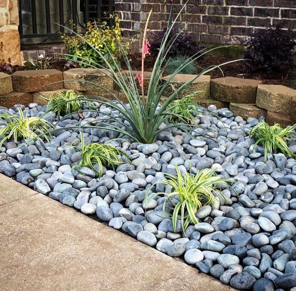 Our XERISCAPE service offers homeowners the opportunity to enhance their outdoor living space with custom-designed, high-quality curb appeal that are expertly crafted to meet their needs and preferences. for Divine Landscaping Services  in Stillwater, OK