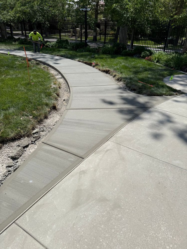 Our Sidewalk Installation service offers homeowners durable, expertly crafted walkways that enhance curb appeal and ensure safety. Trust our skilled team for precision work tailored to your property's unique needs and style. for TNT Concrete and Construction LLC in Roy, UT