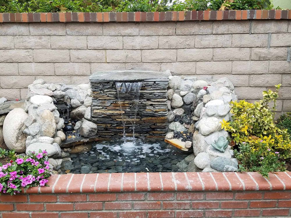 Enhance your outdoor space with our expert water features service, adding elegance and tranquility to your home through custom-designed ponds, fountains, and waterfalls that seamlessly blend with your landscape. for Ida-Home Hardscapes in Coeur d'Alene, ID