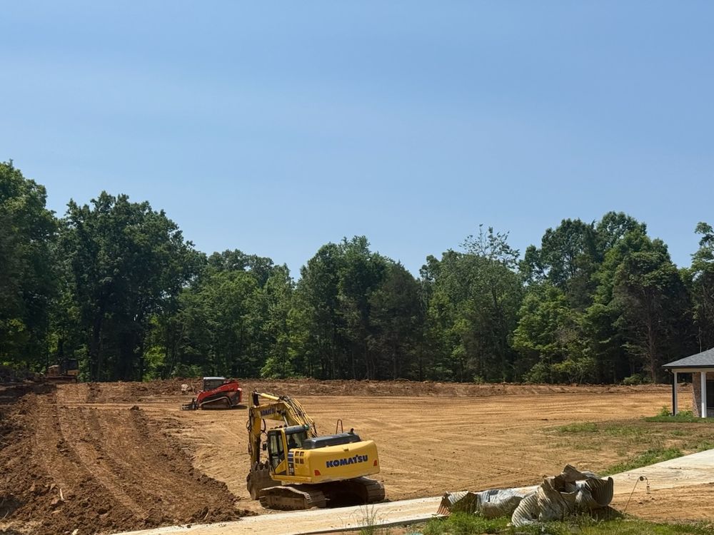 Discover what is land clearing with our expert service, transforming wooded or overgrown lots into usable space by removing trees, shrubs, and debris while providing precise grading for optimal drainage and site preparation. for Louisville Earth Movers in Crestwood, KY