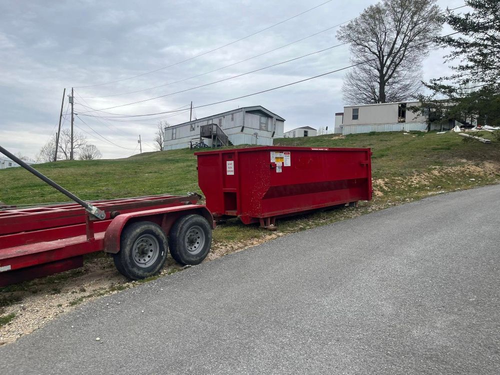 Our 17 Yard Dumpster Rental service offers homeowners an efficient way to handle home renovation waste, yard debris, and clutter removal with prompt delivery and pickup tailored to your schedule. for Toss It Waste LLC in Harriman, TN