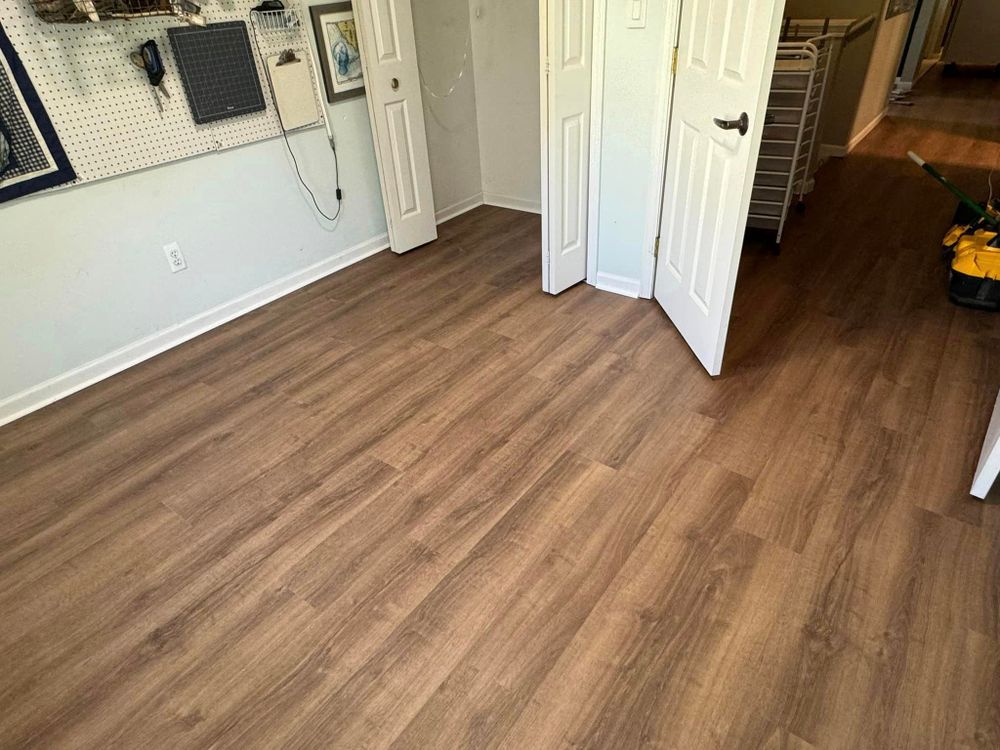 Our Flooring service offers a wide range of high-quality materials and expert installation to enhance the aesthetics and functionality of your home, transforming it into a stylish and comfortable space. for Chapman Surfaces Tile & Remodeling in Milan, MI